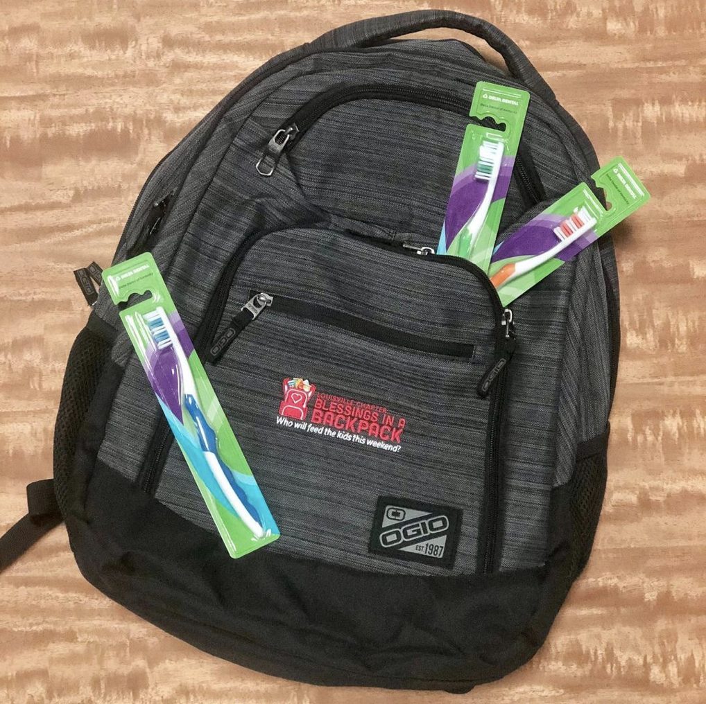 backpack and toothbrushes